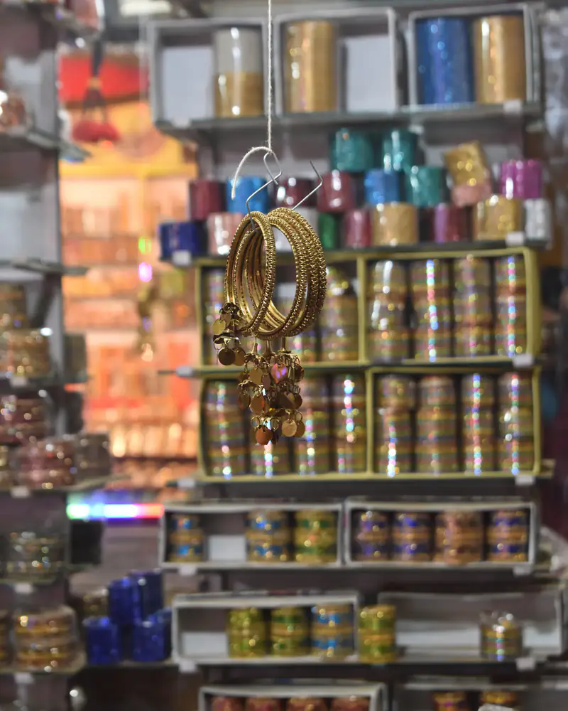 Gold bangles on display in a jewellery shop