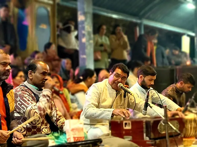 Singers and tabla players at an evening devotional gathering in Rishikesh